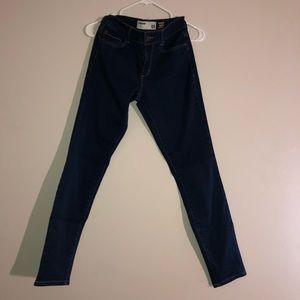 dark blue garage mid rise skinny jeans